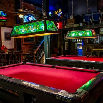 Man cave pub with pool tables