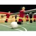 Foosball player kicking ball on Bonzini B90 table